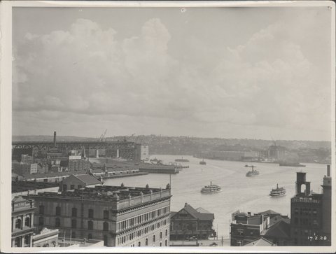 View from Circular Quay during the construction of Sydney Harbour Bridge, 1928