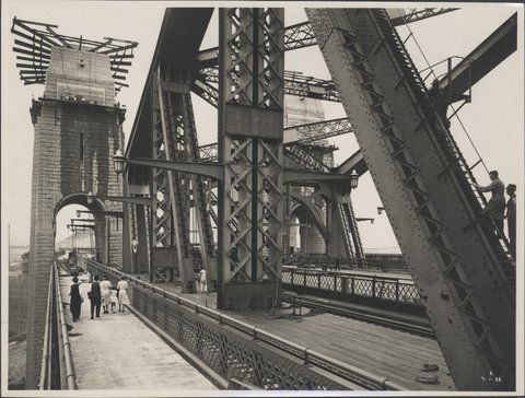 Two women and a child on the walkway of the Sydney Harbour Bridge, 1932
