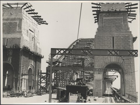 Workers attaching electric cables on the Harbour Bridge, 1932