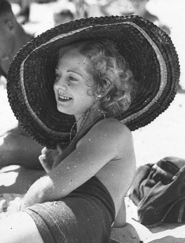 Woman in sun-hat, Bondi Beach (cropped), 1935