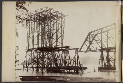 Scaffolding for construction of Hawkesbury River Railway Bridge, New South Wales, Australia, moves away from span atop timber framework on pontoon) - C. Bayliss photo, Sydney LCCN2016651662, 1888
