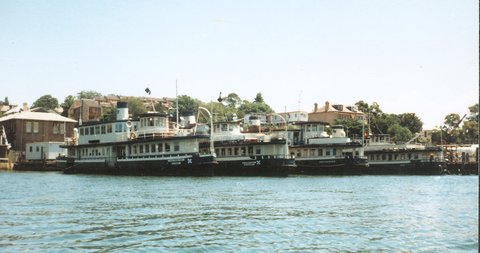 Sydney ferries LADY EDELINE and KARINGAL and KAMERUKA and KARRABEE at Balmain ferry base 1980