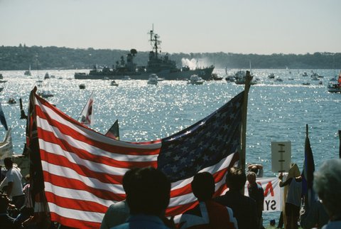 The American flag is raised as the guided missile destroyer USS BERKELEY (DDG 15) passes in review during the Australian bicentennial celebration - DPLA - fac1053bdbebf28577111faf24632c6c, 1988